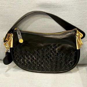 Black handbag with gold fittings